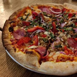 Fuego Bistro and Pizzeria - 12-inch Wasatch Wood Fire Pizza with Vegan Cheese ($3) and additional toppings
