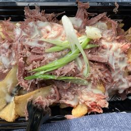 St Patrick's Day special - loaded potato wedges with corned beef. Pretty good. Very generous portion. St Patrick's Day special - loaded potato wedges with corned beef. Pretty good. Very generous portion.