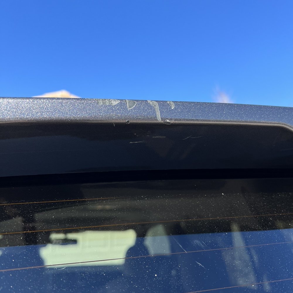 Cobblestone Auto Spa - Damage spoiler due to cobblestone car wash - Auto Detailing Near Me - Gilbert, Arizona