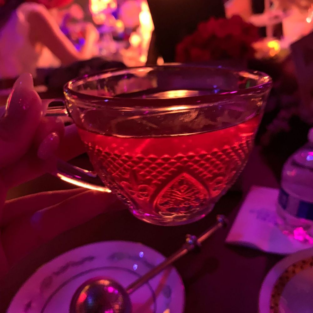 Mad Hatter - a glass of tea with a spoon in it - Venues & Event Spaces Near Me - Dallas, Texas Mad Hatter - a glass of tea with a spoon in it - Venues & Event Spaces Near Me - Dallas, Texas