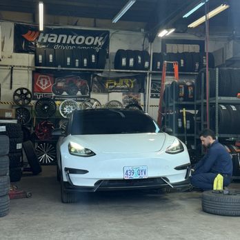 Xpress Tire & Auto Service - Tesla model 3 performance inside their shop - Auto Repair Near Me - Gresham, Oregon Xpress Tire & Auto Service - Tesla model 3 performance inside their shop - Auto Repair Near Me - Gresham, Oregon