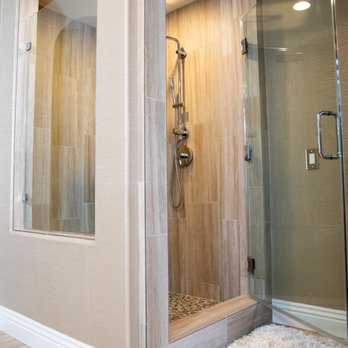 Firestone Builders - a walk in shower with a glass door - Masonry/Concrete Near Me - San Marcos, California