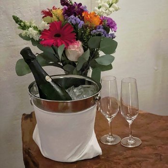 boon hotel + spa - Champagne and flowers awaiting our arrival in the room. Ice had not even began to melt! - Hotels Near Me - Guerneville, California