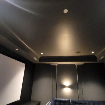 Milaf Construction - a modern home theater room - Handyman Near Me