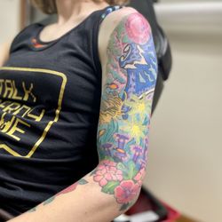Liquid Color Tattoo Studio - Color under the sea illustrative tattoo from Liquid Color Tattoo Studio in Fort Collins, CO.