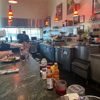 Mo's Grill - Shot of the counter and kitchen from the rear looking towards the front door. - Burgers Near Me - San Francisco, California Mo's Grill - Shot of the counter and kitchen from the rear looking towards the front door. - Burgers Near Me - San Francisco, California