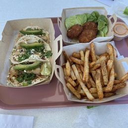 Crab cakes, fries and fish tacos Crab cakes, fries and fish tacos