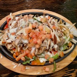 Mi Casa Mexican Restaurant - Chicken fajitas $23.99 huge price increase from just a couple years ago. Still delicious.