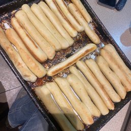 a pan full of breadsticks a pan full of breadsticks