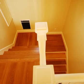 Pro Home Services - a staircase leading to a second floor - Flooring Near Me - Lynnwood, Washington Pro Home Services - a staircase leading to a second floor - Flooring Near Me - Lynnwood, Washington