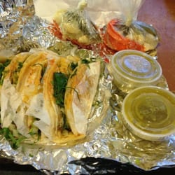 Los Agaves - Steak and chorizo (Mexican sausage) tacos. Green salsa, and spicy vegetables.