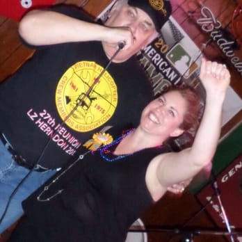 King's X - a man and a woman singing - Bars Near Me - Dallas, Texas