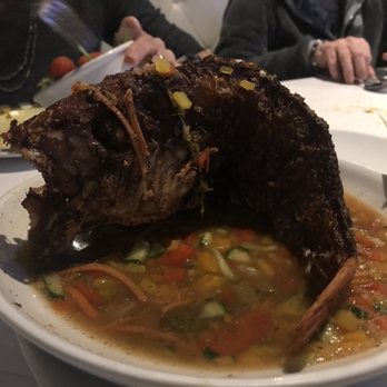 Yah Mon - Fish Escavitche - whole red snapper perfectly fried and served in a tangy vegetable sauce. - Caribbean Near Me - Tampa, Florida
