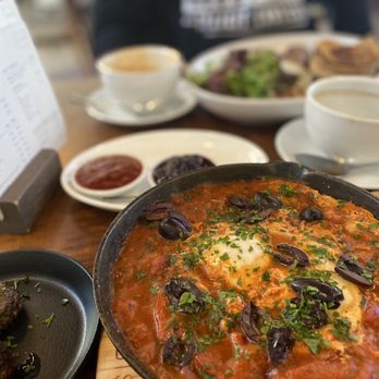 Sabà Bistro - Shashuka - Gluten & dairy free option available. Eggs, tomatoes (extremely tangy), peppers, olives, and a side of 2 lamb meatballs - Bistros Near Me - Langley, British Columbia Sabà Bistro - Shashuka - Gluten & dairy free option available. Eggs, tomatoes (extremely tangy), peppers, olives, and a side of 2 lamb meatballs - Bistros Near Me - Langley, British Columbia
