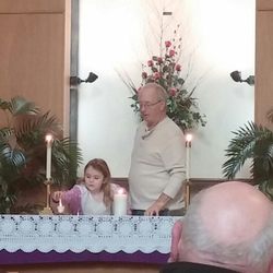 Chapel by the Sea - Lighting candles at the start of worship.
