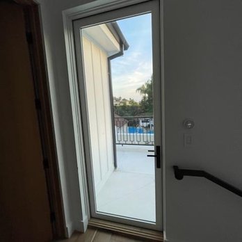 Ocean View Window Tint - Door which opens to balcony tinted slightly with anti glare to prevent sun damage. - Home Window Tinting Near Me Ocean View Window Tint - Door which opens to balcony tinted slightly with anti glare to prevent sun damage. - Home Window Tinting Near Me