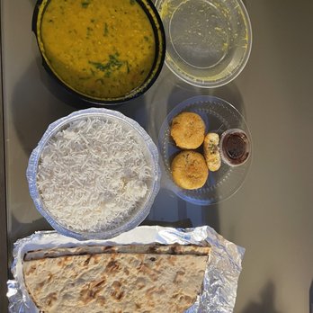 Saffron Indian Cuisine - Yellow Mellow, tandoori roti and spiced potato medallions. - Indian Near Me - Astoria, New York Saffron Indian Cuisine - Yellow Mellow, tandoori roti and spiced potato medallions. - Indian Near Me - Astoria, New York