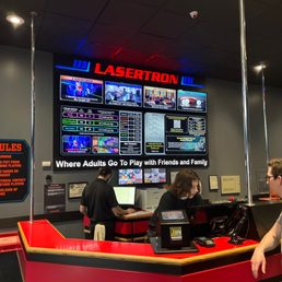 a man and a woman working at a counter