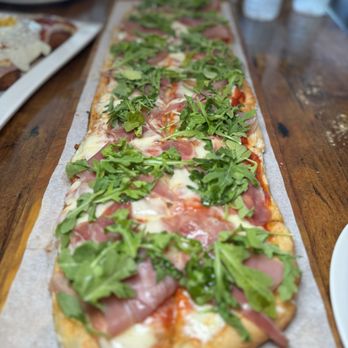 Manolo - Arugula and prosciutto pizza - Coffee & Tea Near Me - Miami Beach, Florida