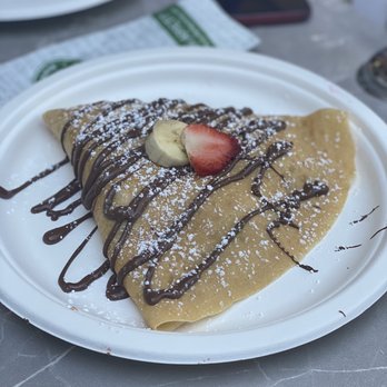 iCafe de Paris - a crepe with chocolate and strawberries - Creperies Near Me - Orlando, Florida