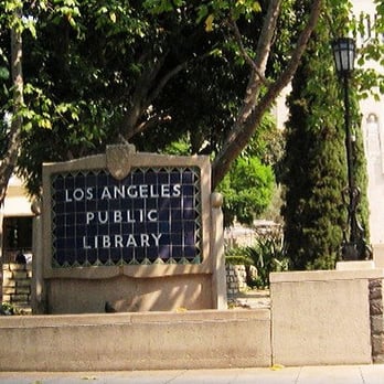 Central Library - signage from flower st. just before underground pkg lot entrance - Libraries Near Me - Los Angeles, California