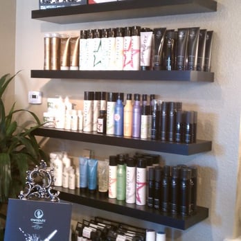 Vintage Hair Studio - A close up of the product shelves. - Hair Salons Near Me - Ramona, California