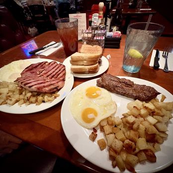 Village Pub Rainbow - Ham steak & eggs (L). NY steak and eggs (R) - Pubs Near Me - Las Vegas, Nevada Village Pub Rainbow - Ham steak & eggs (L). NY steak and eggs (R) - Pubs Near Me - Las Vegas, Nevada