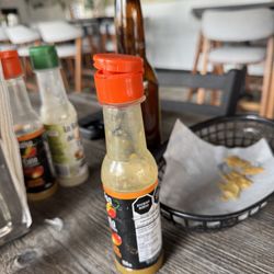 El Cata - The bottles of salsa many of them were as you can see them open, which seem a very safe way of storing salsa.