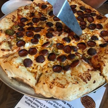 Anchor Bar-Schertz - Large pizza with pepperoni, jalapeños and black olives. - Bars Near Me - Schertz, Texas Anchor Bar-Schertz - Large pizza with pepperoni, jalapeños and black olives. - Bars Near Me - Schertz, Texas