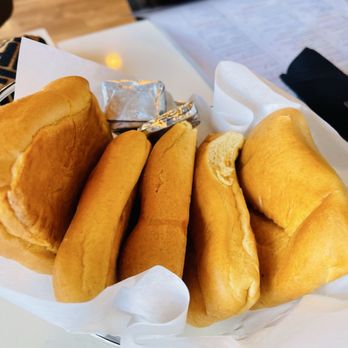 Escovitchez - Coconut bread upon seating - Caribbean Near Me - Atlanta, Georgia