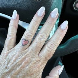 Natural nails, with dip manicure. Ask for Bettie.