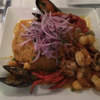 La Guitarra con Sazon - Seafood rice dish cooked in a wok - Latin American Near Me - Houston, Texas La Guitarra con Sazon - Seafood rice dish cooked in a wok - Latin American Near Me - Houston, Texas