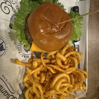 Shaky Jakes - "No Meat, No Problem" burger with curly fries. - Chicken Wings Near Me - Broken Arrow, Oklahoma