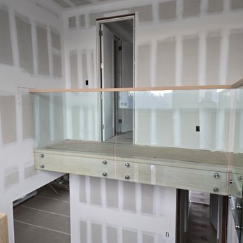 Step By Step Stairbuilder - Glass railing job in West Hampton - General Contractors Near Me - Holbrook , New York Step By Step Stairbuilder - Glass railing job in West Hampton - General Contractors Near Me - Holbrook , New York