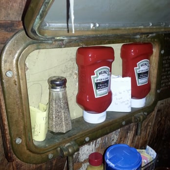 Barnacle Bill's - Secret compartment near our table. We put a note there if you can find it. - Bars Near Me - Rumson, New Jersey