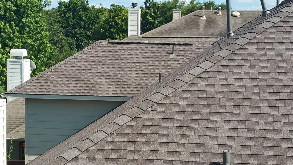 Slide of Freetail Roofing