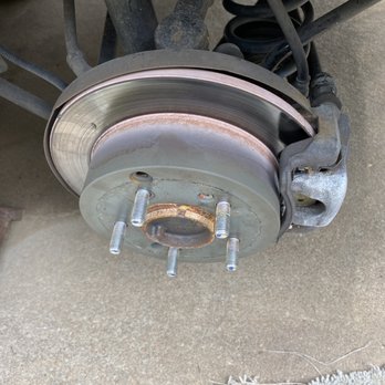 Allen Car Care Center - The redness around the rotor is it catching fire. - Auto Repair Near Me - Allen, Texas Allen Car Care Center - The redness around the rotor is it catching fire. - Auto Repair Near Me - Allen, Texas