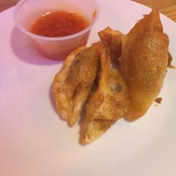 The Village Pizzeria - Kimchi dumplings with chili dipping sauce