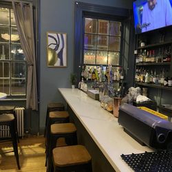 Bar counter with a few stools