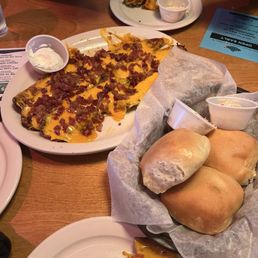 Potato skins and fresh hot rolls with cinnamon butter. Potato skins and fresh hot rolls with cinnamon butter.