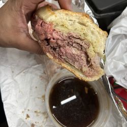 Charlie’s Butchers - Sliced meat and cheese on a garlic hero  I already munched down the first half