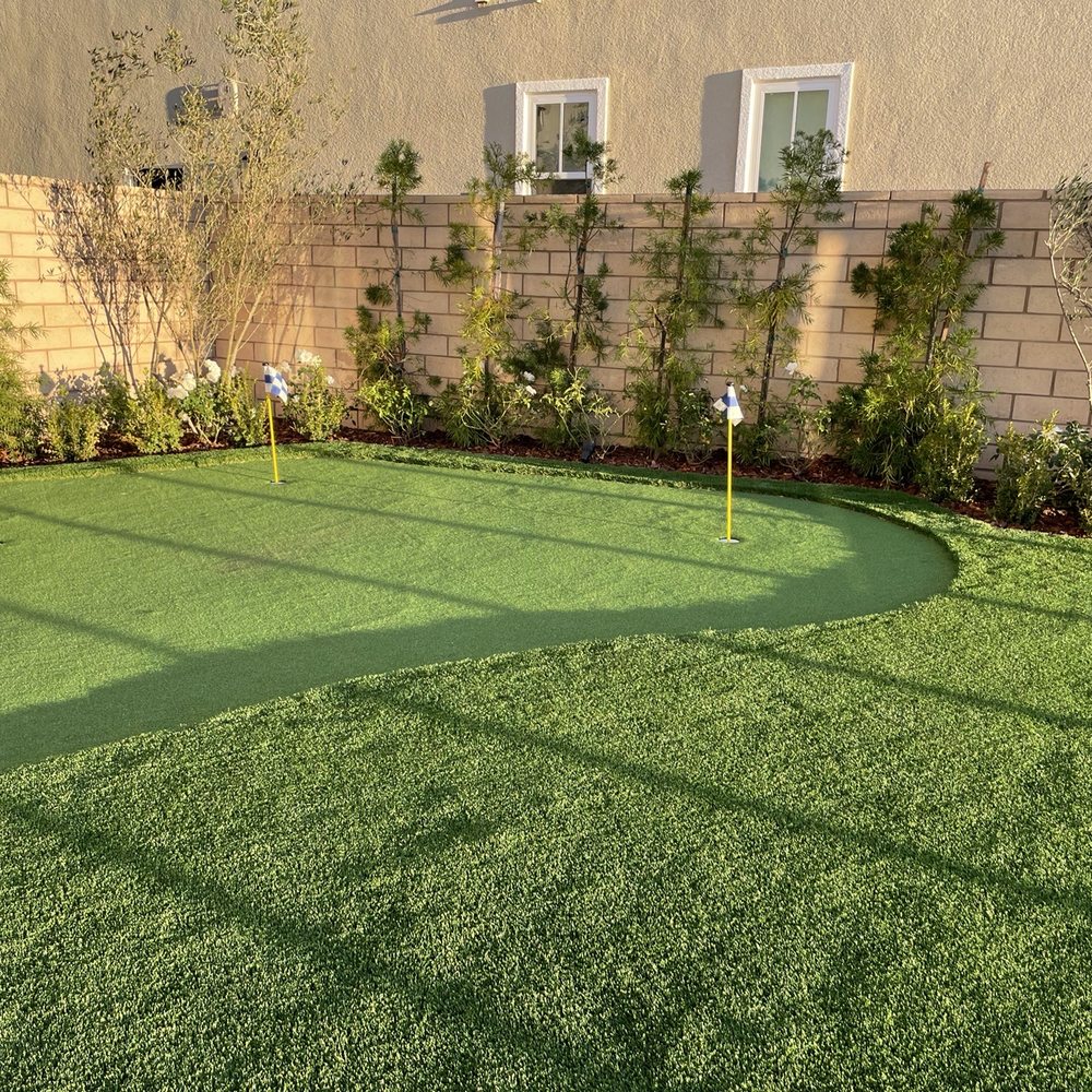 Pristine Scapes - a backyard with artificial turf - Artificial Turf Near Me - Orange, California