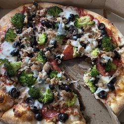 Horsham Pizza - Personal pizza with pepperoni, sausage, broccoli, and olives.