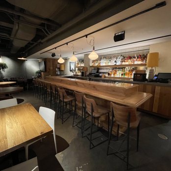 Beatrix Market - a bar with stools and tables - New American Near Me - Chicago, Illinois