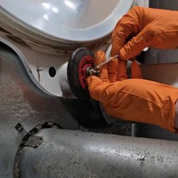 Bobs Appliance - Installing a new dryer drum support roller to restore smooth, quiet operation.