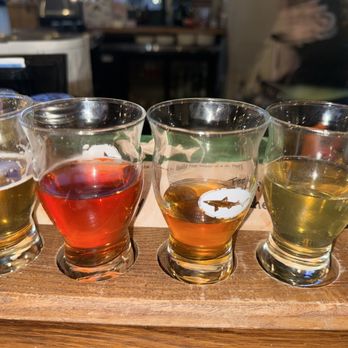 Dogfish Head Brewings & Eats - A flight to taste their seasonal brews - American Near Me - Rehoboth Beach, Delaware