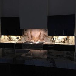 Pacific Shore Stones - Backlit Patagonia Granite Backsplash