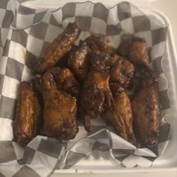 The wings are such a good deal, they're big and super delicious! But the queso... it's just never good and really needs some work.
