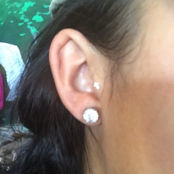 New Age Body Piercing - Little cross in my tragus and it's been over 3 years since I got it. Don't have my 2nd lobe piercings in today. - Piercing Near Me - Miami, Florida New Age Body Piercing - Little cross in my tragus and it's been over 3 years since I got it. Don't have my 2nd lobe piercings in today. - Piercing Near Me - Miami, Florida