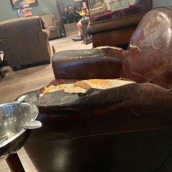 Churchill's Fine Cigars - One of the "open" chairs..... - Cigar Bars Near Me - Phoenix, Arizona Churchill's Fine Cigars - One of the "open" chairs..... - Cigar Bars Near Me - Phoenix, Arizona